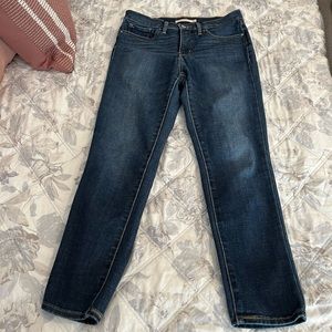 Levi dark wash jeans, “311 Shaping Skinny” style, size 27, lightly worn